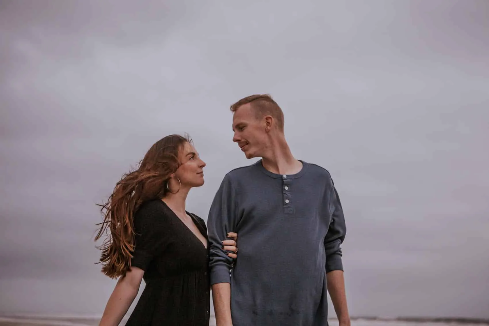 Family of four together at the 3rd Street access on Atlantic Beach in Jacksonville
