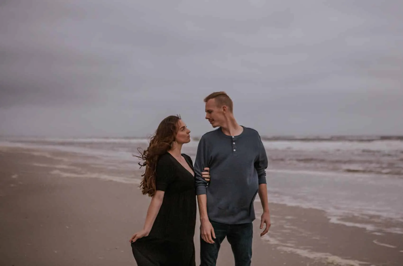 Family of four together at the 3rd Street access on Atlantic Beach in Jacksonville