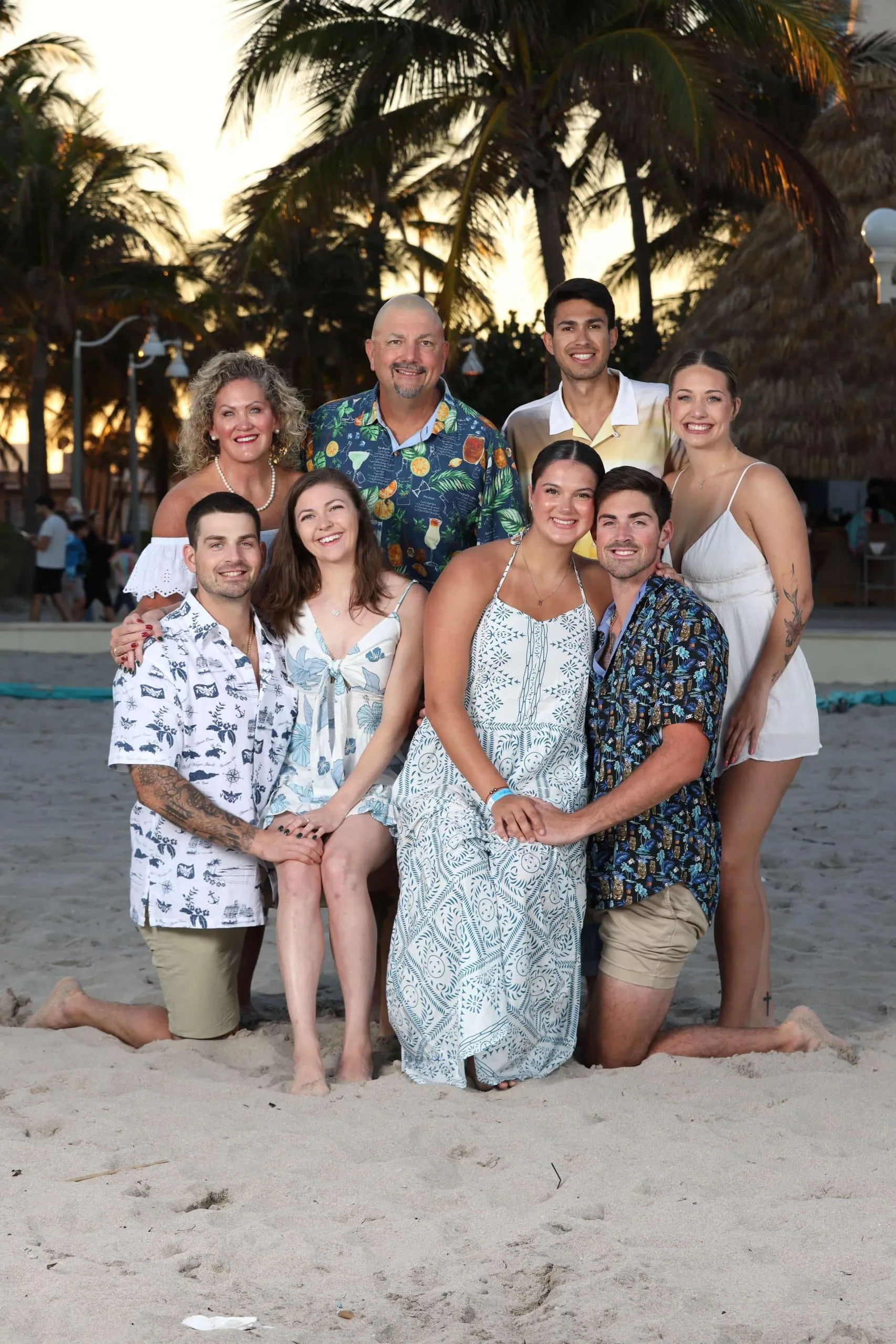 Family together on the beach during a morning session in Boca Raton, Florida