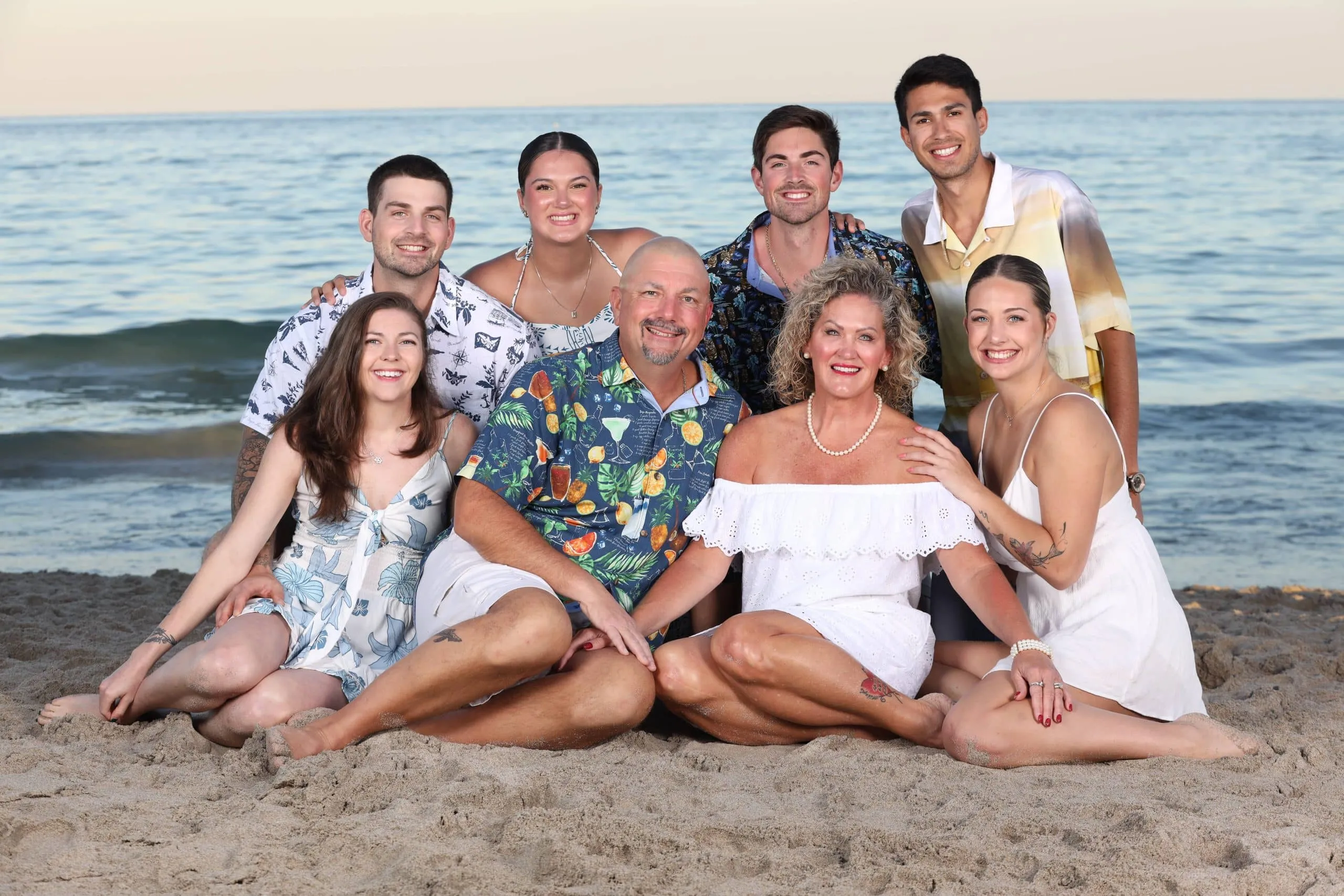 Family together on the beach during a morning session in Boca Raton, Florida