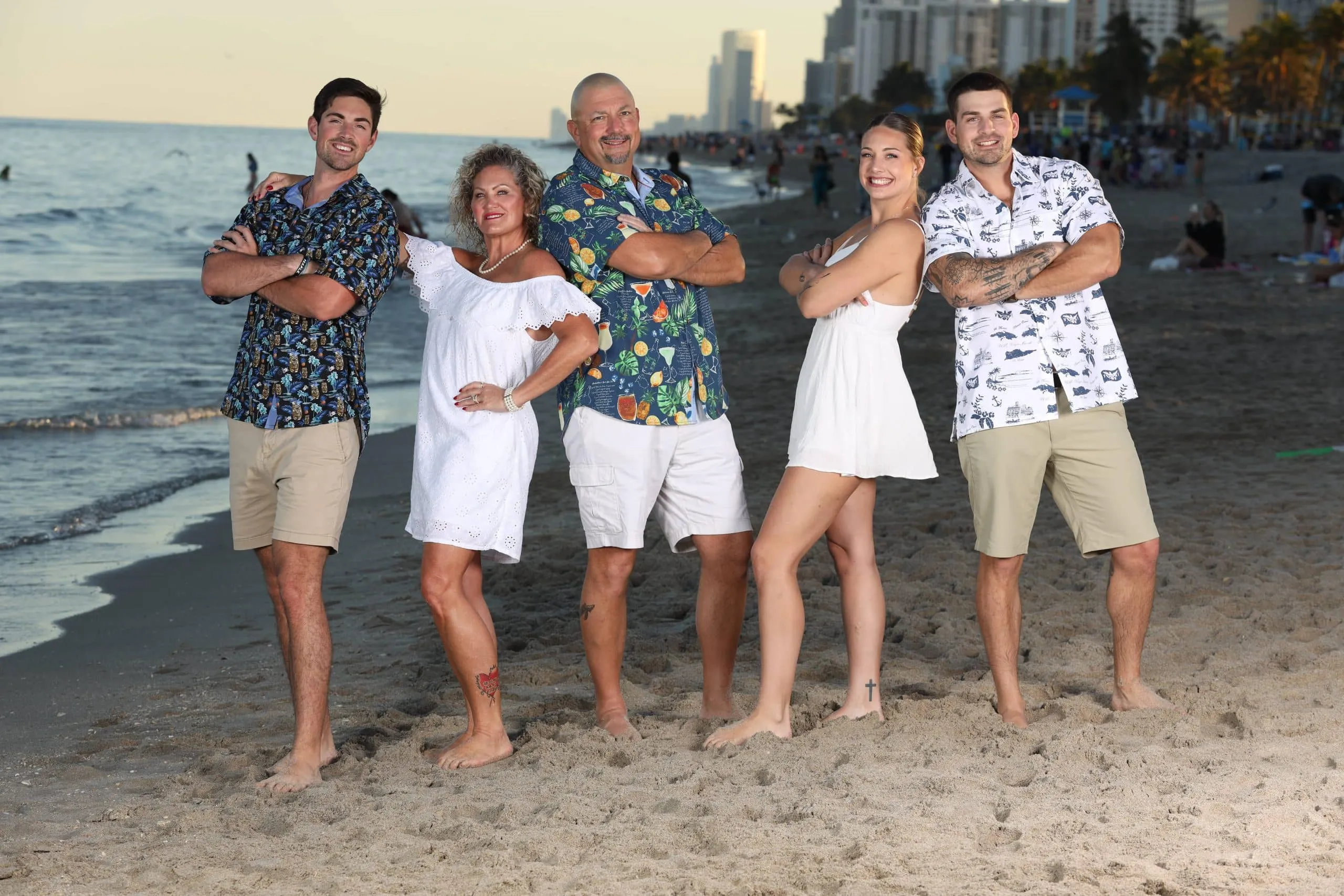Family together on the beach during a morning session in Boca Raton, Florida