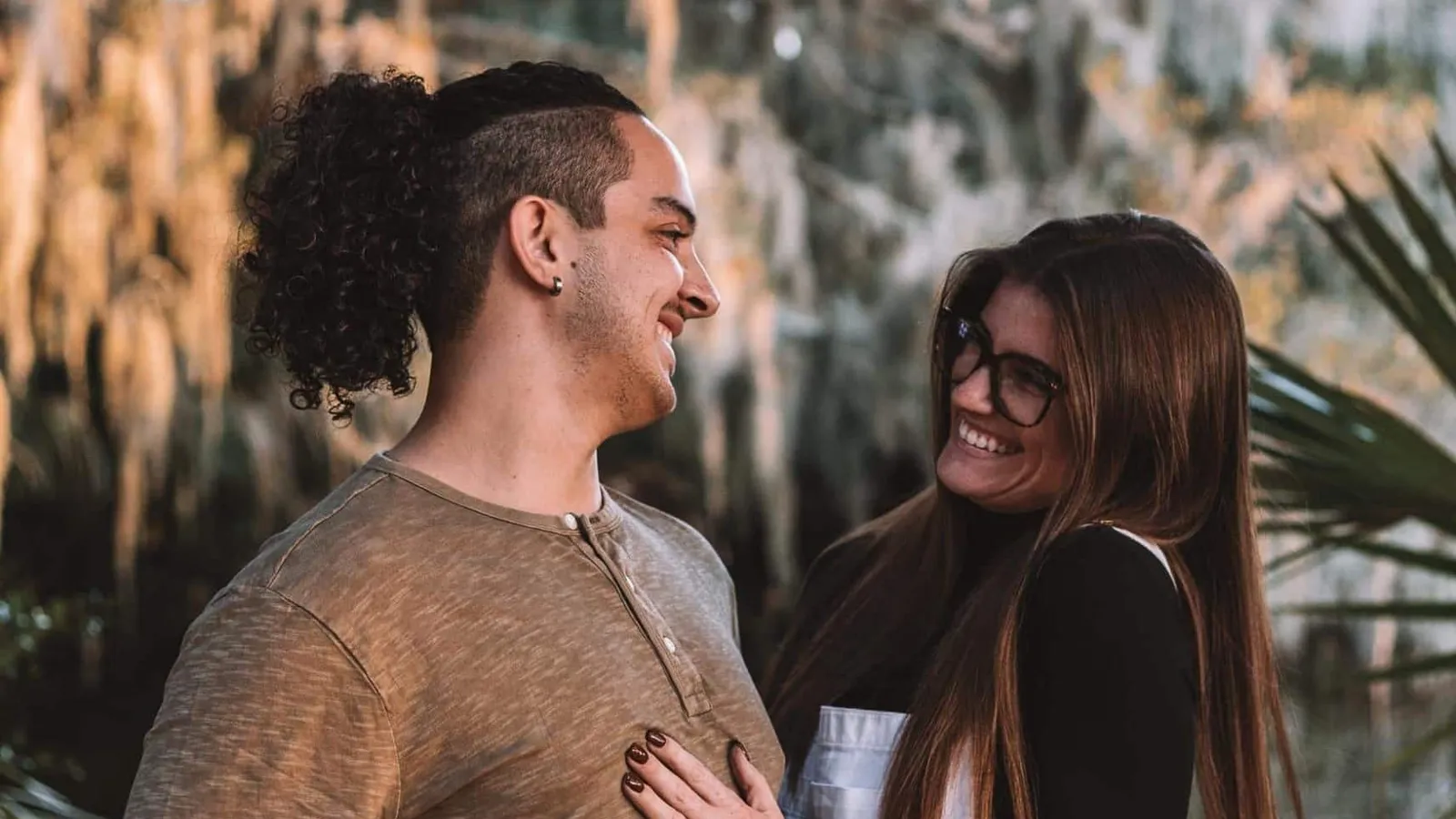 Couple together among the greenery at Hanna Park in Jacksonville