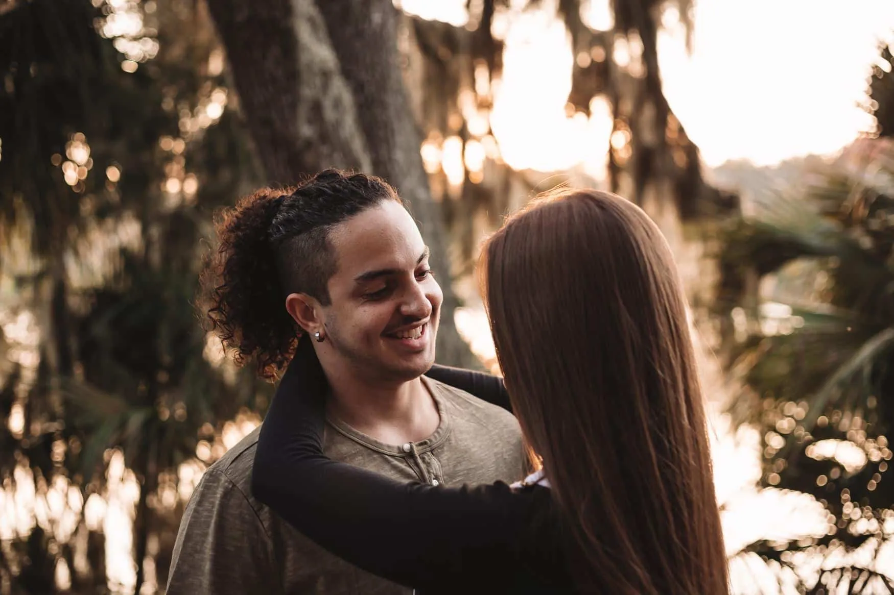 Couple together among the greenery at Hanna Park in Jacksonville