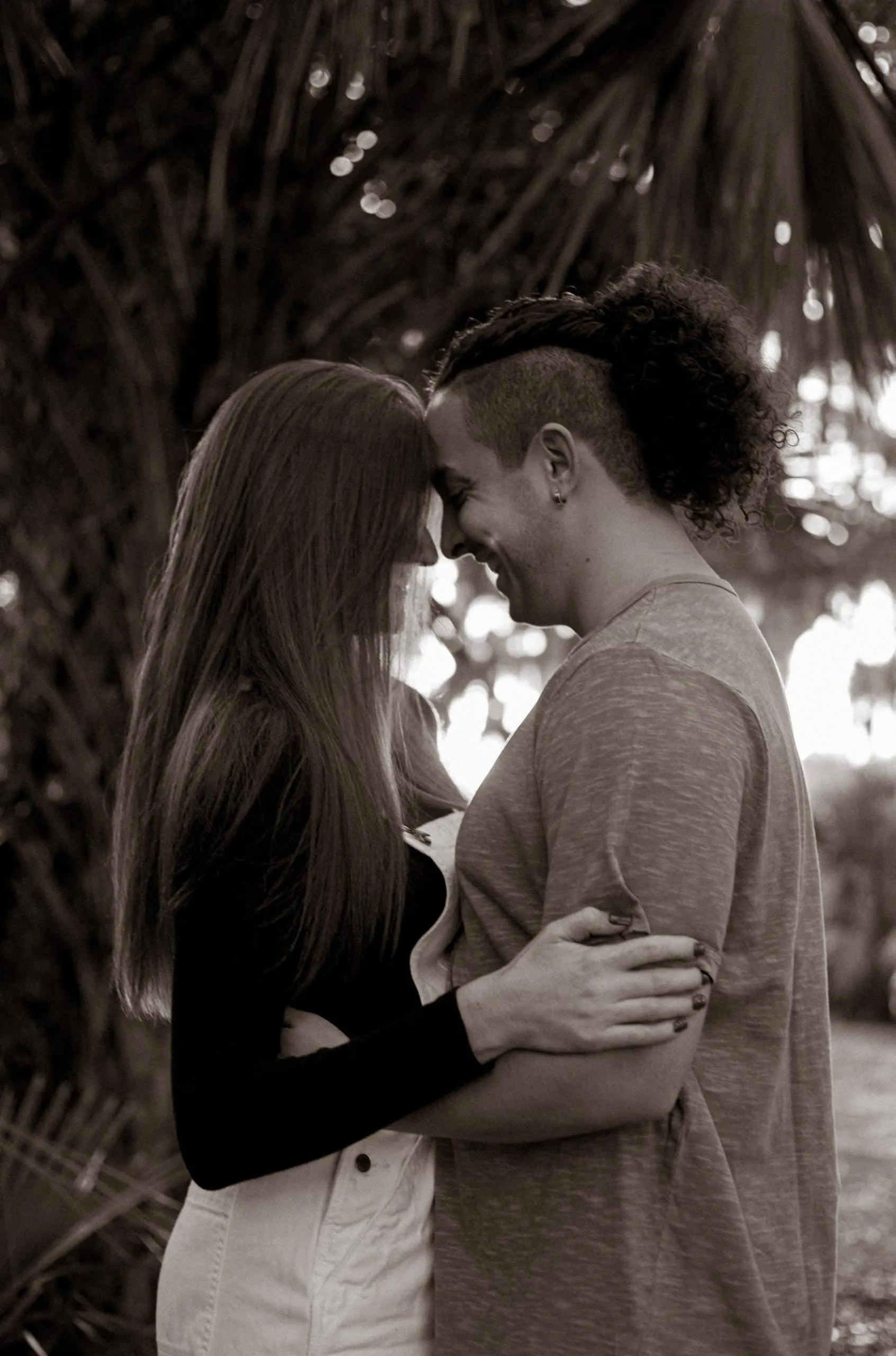Couple together among the greenery at Hanna Park in Jacksonville