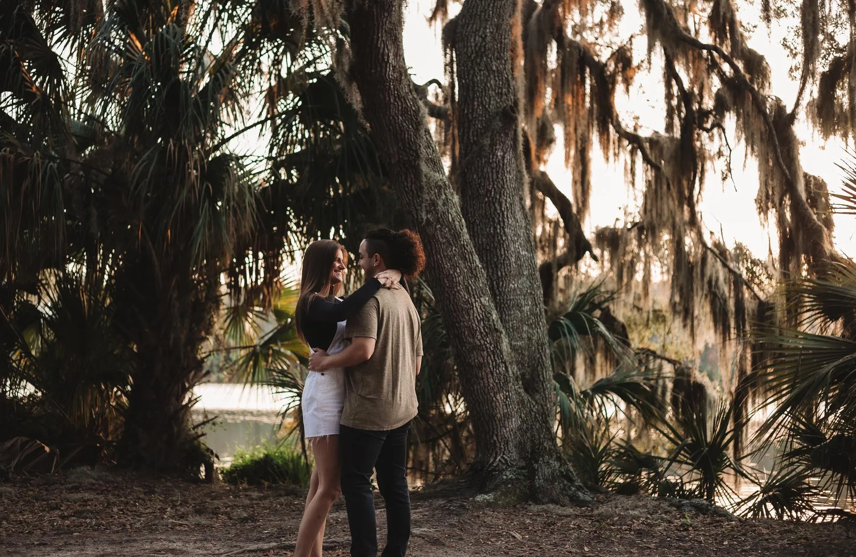 Couple together among the greenery at Hanna Park in Jacksonville