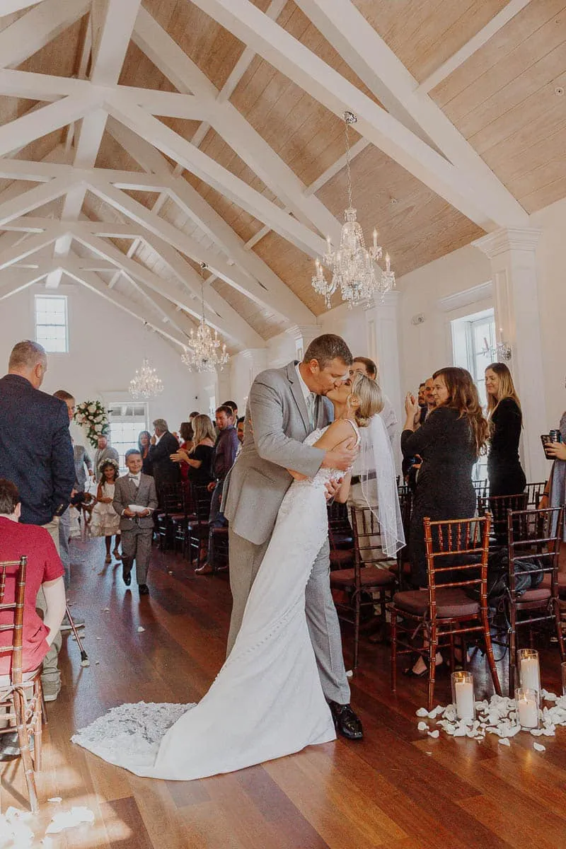 Bride and groom with a small bridal party during an intimate Sarasota wedding