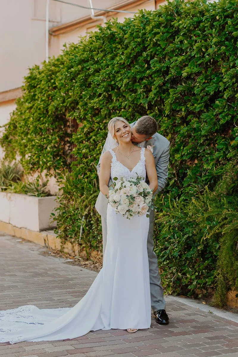 Bride and groom with a small bridal party during an intimate Sarasota wedding