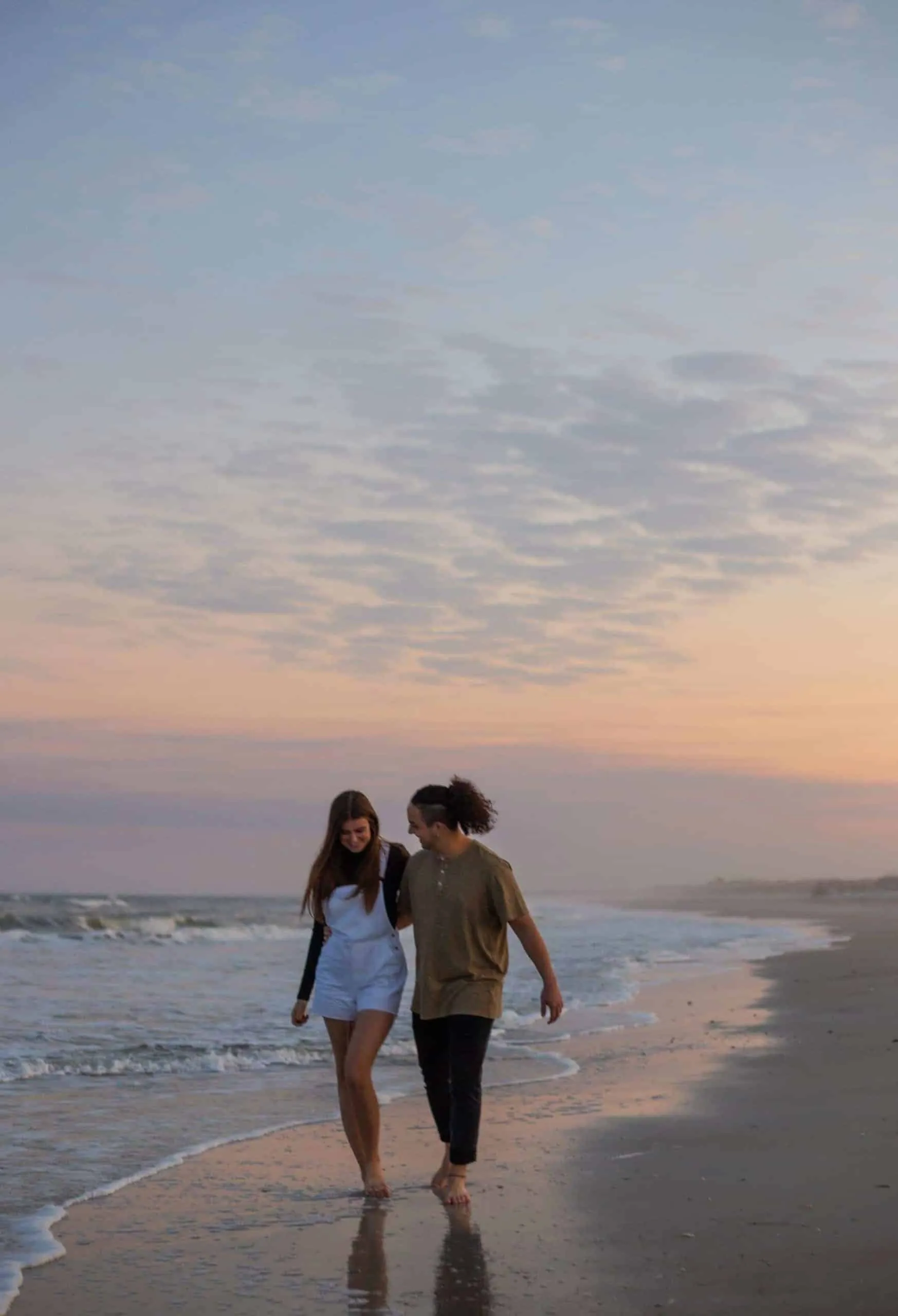 Couple together at The Poles Beach in Jacksonville for an anniversary session