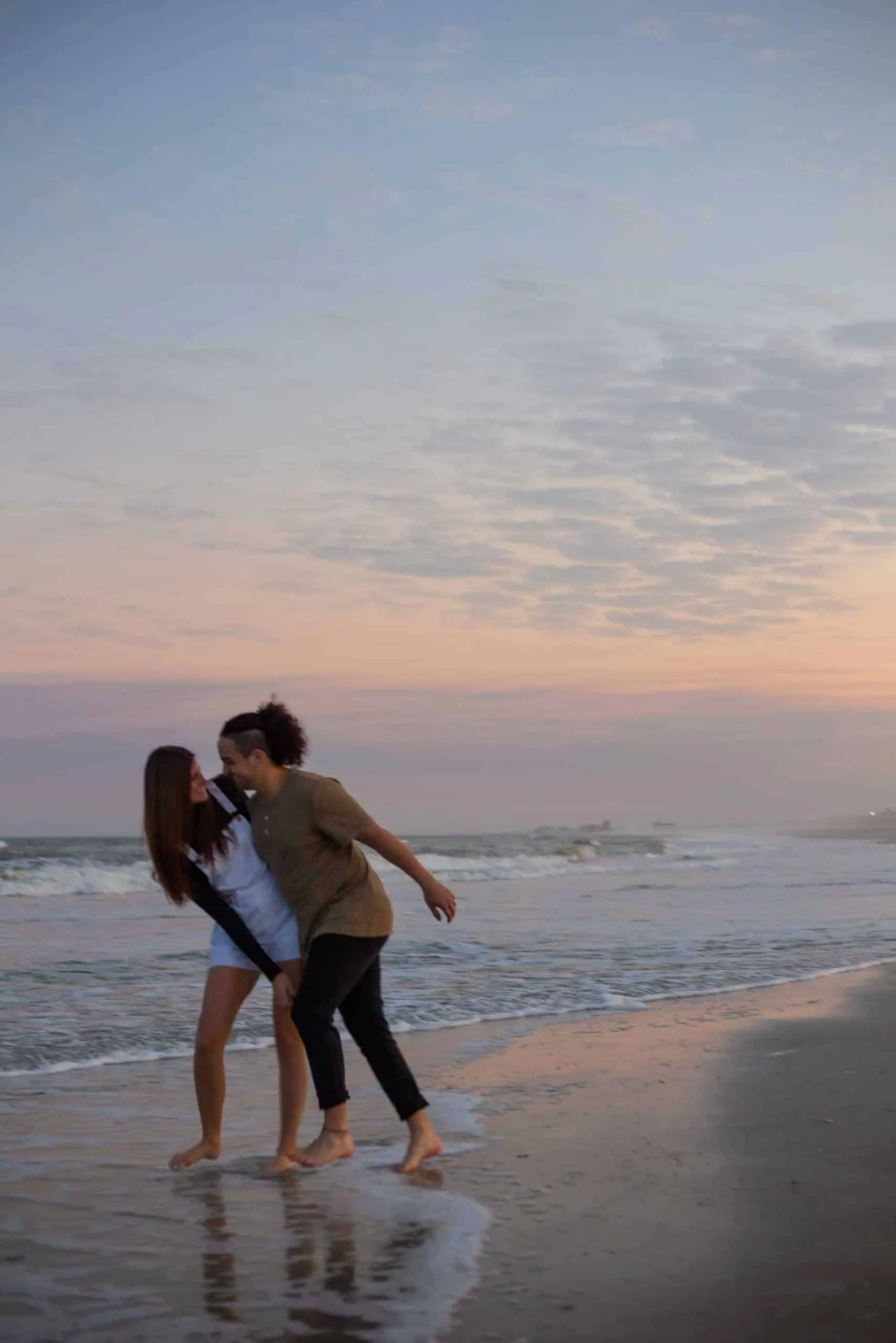 Couple together at The Poles Beach in Jacksonville for an anniversary session