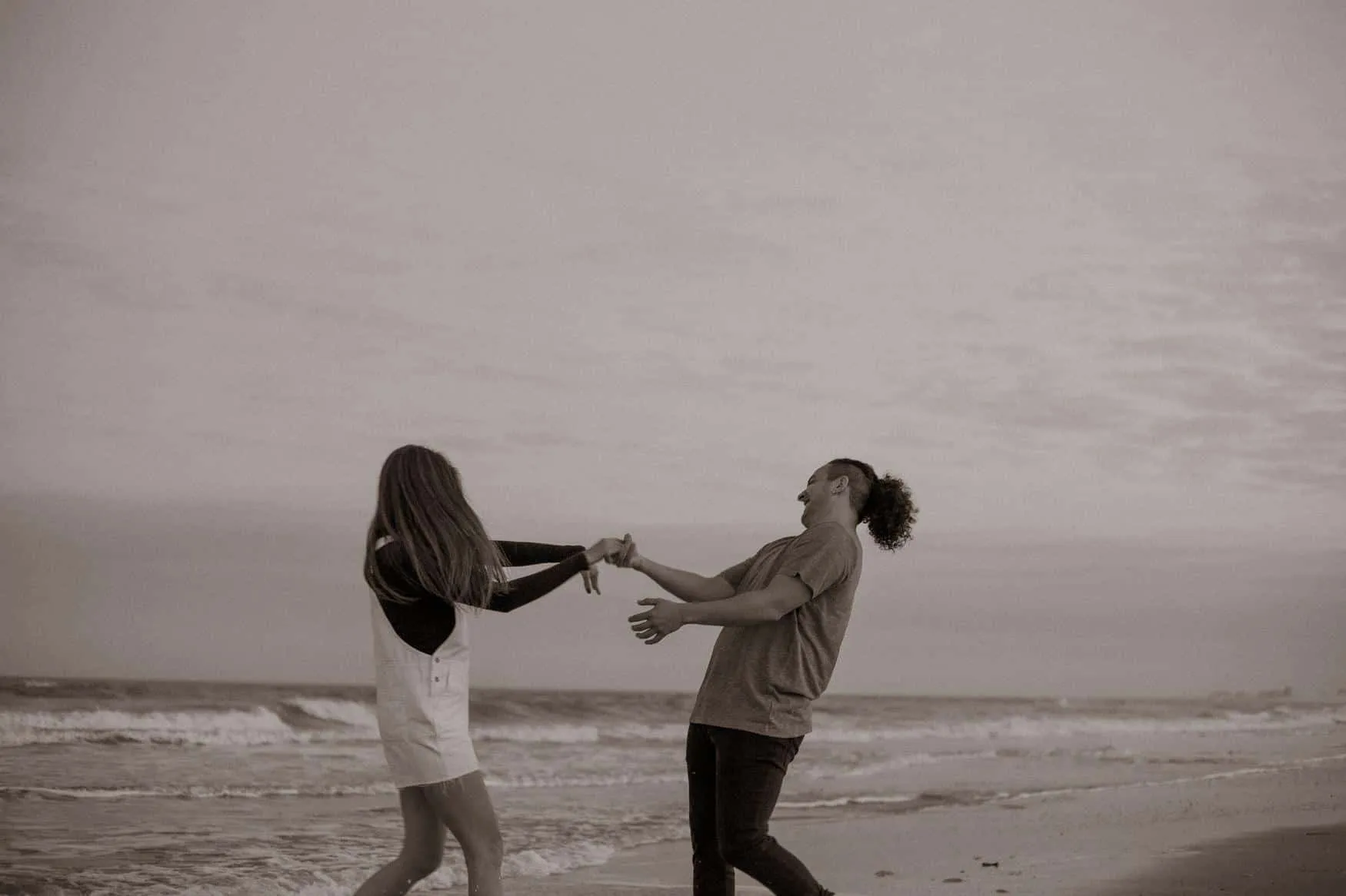 Couple together at The Poles Beach in Jacksonville for an anniversary session