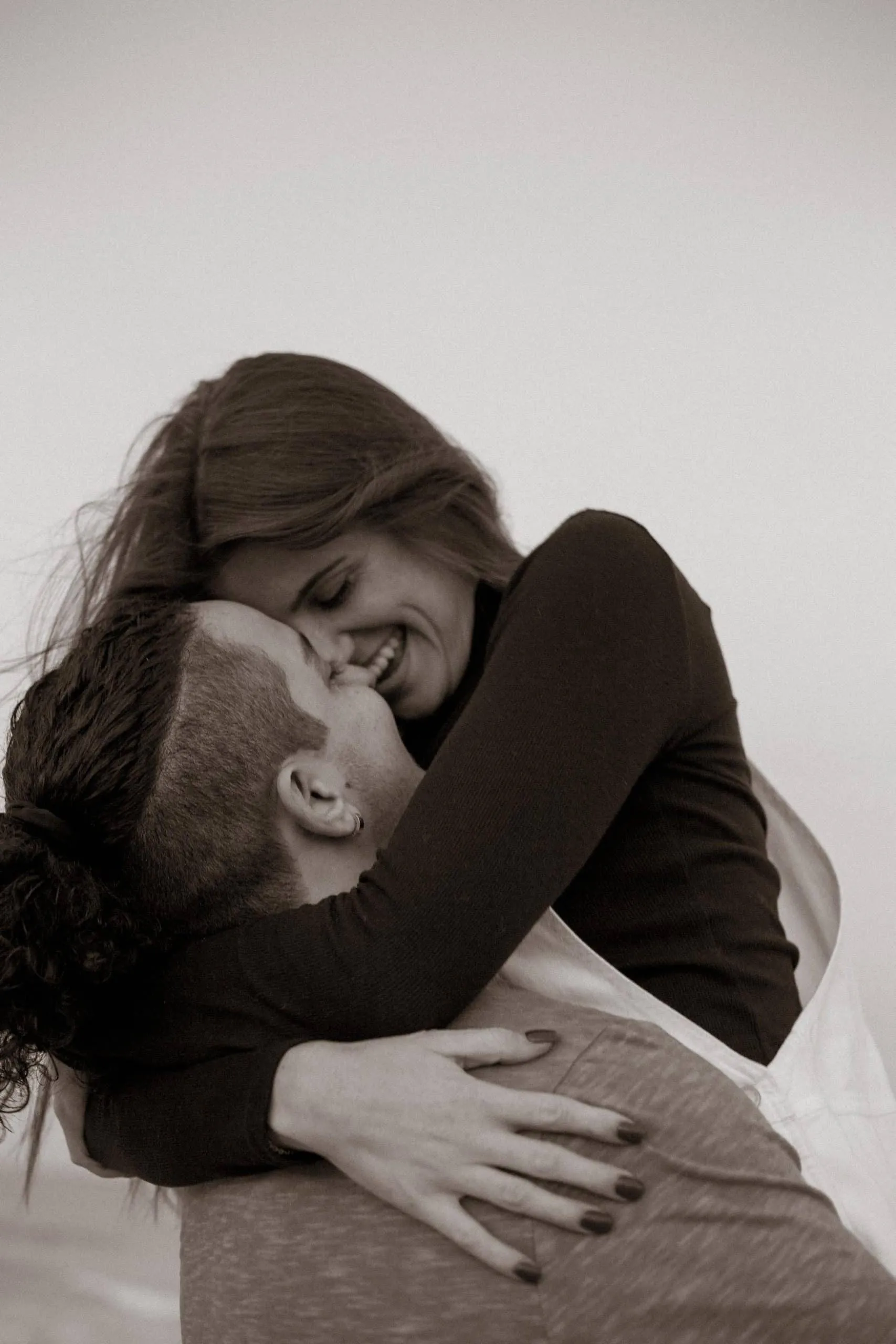 Couple together at The Poles Beach in Jacksonville for an anniversary session